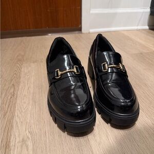 Elegant Black Loafers with Gold Accent